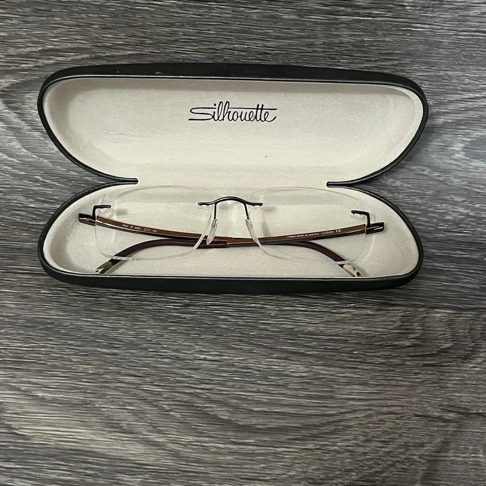 Silhouette Rimless Titanium SPX Frames 7642 40 6055 Brown Burgundy 17x135
